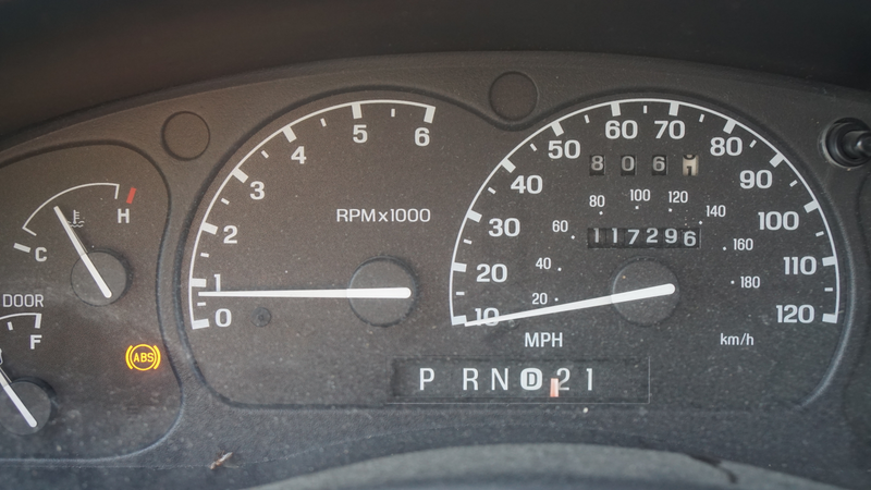 Ah, an ABS light. But, low miles!